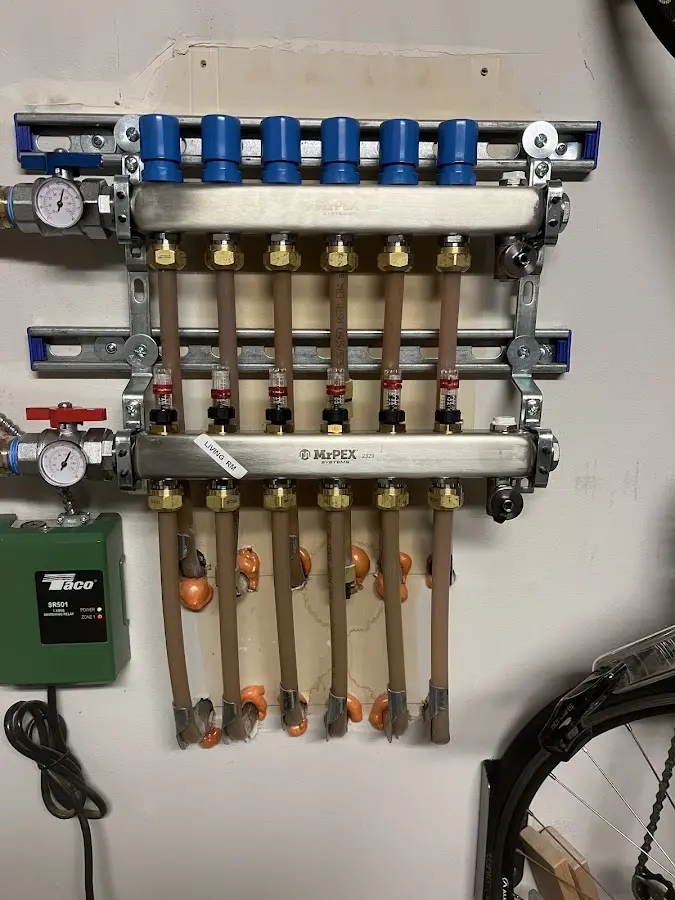 Plumber performing Water Heater Repair at a residential property in Cornelius